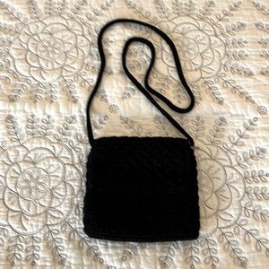 The Sak black woven crossbody. 7”x6”.